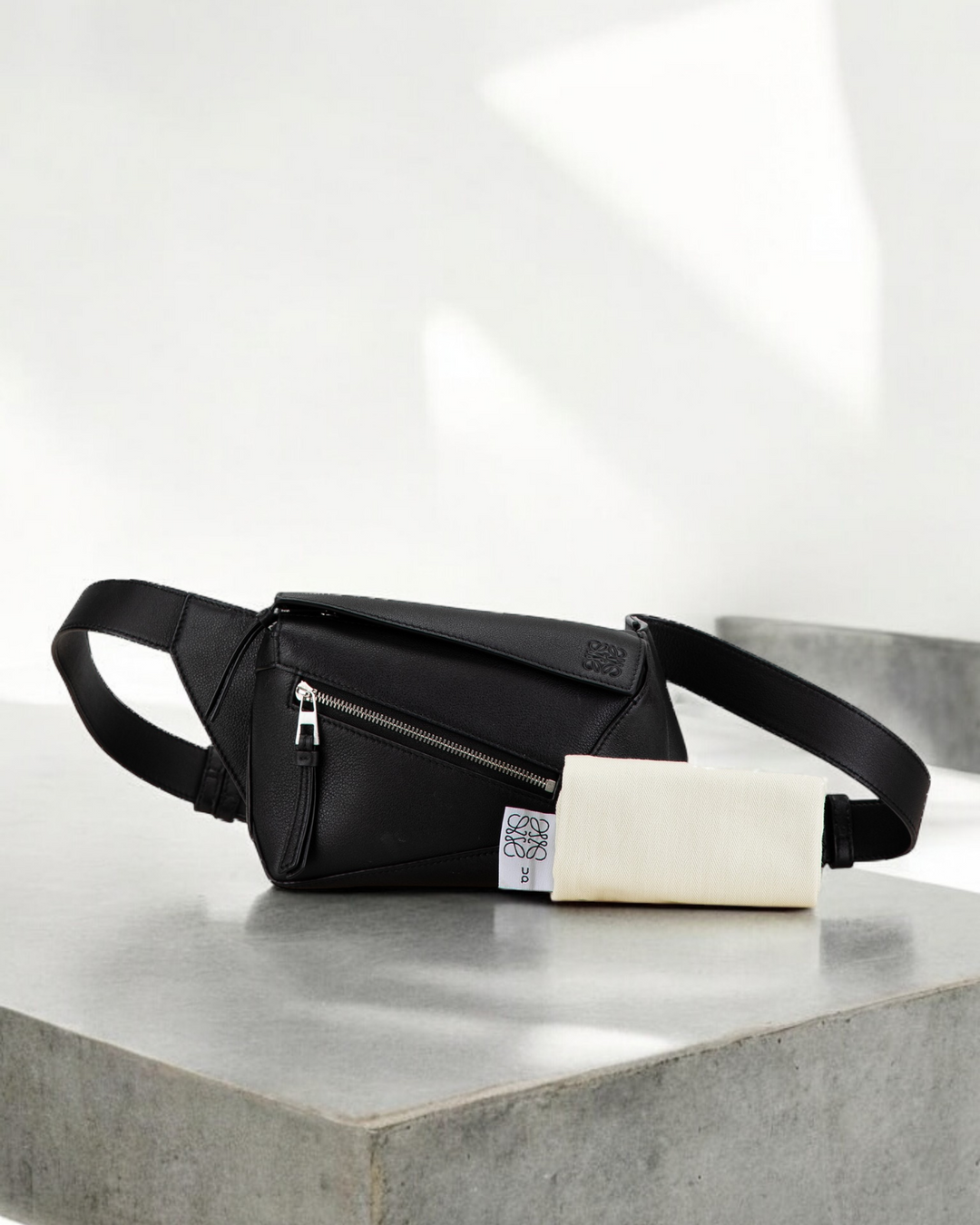 Preowned used Loewe Mini Puzzle Belt Bag in black with dustbag black friday sale - Forgotten Luxuries