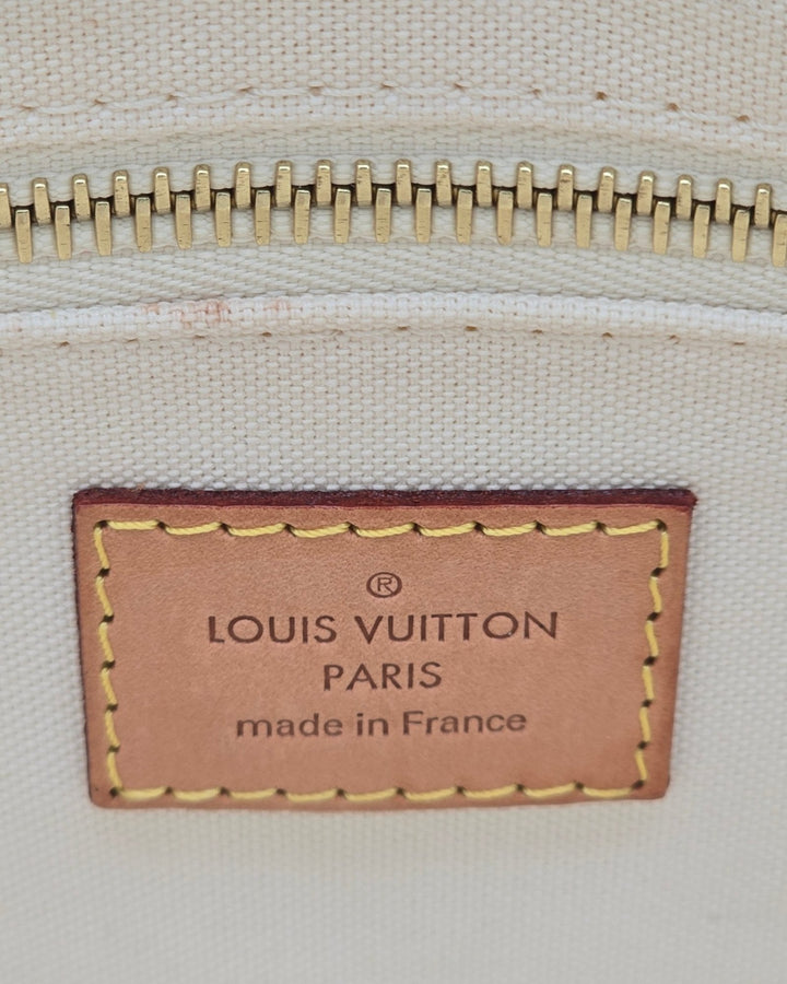 Louis Vuitton Cabas Adventure PM Tote Bag Damier Azur Louis VuittonCabas Adventure PM Tote Bag Damier AzurLouis Vuitton LV Cabas Adventure PM Tote Bag Damier Azur in white with leather strap Articles de voyage paris 101, champs - elysees close up 4k HDForgotten Luxuries Forgotten Luxuries