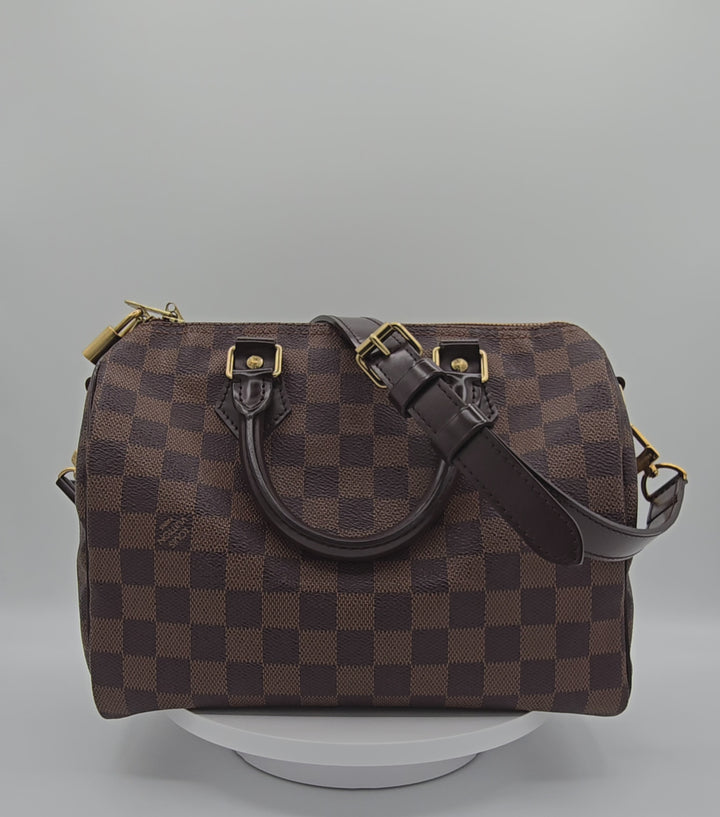 Louis Vuitton LV Damier Ebene Speedy Bandouliere 25 bag brown canvas leather with gold hardware 360 spin slow motion video 4k hd forgotten luxuries